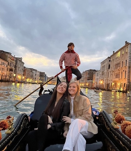 Mariana Garces Grajales with friend in gondola in Italy