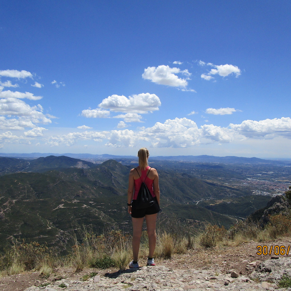 Student standing on Monserrat Mountain, Barcelona, Spain