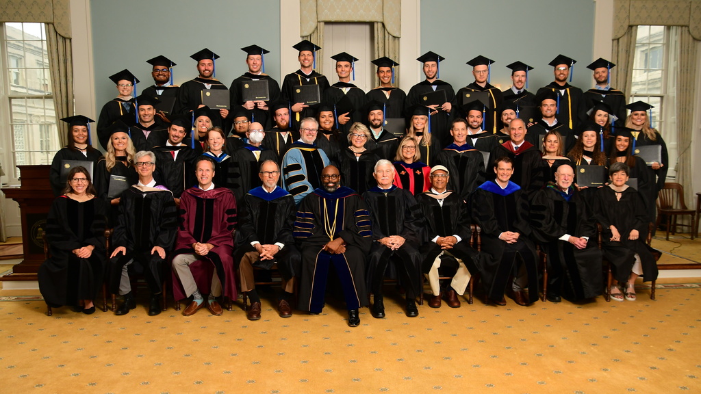 CIMBA graduates with UI and CIMBA faculty and administrators