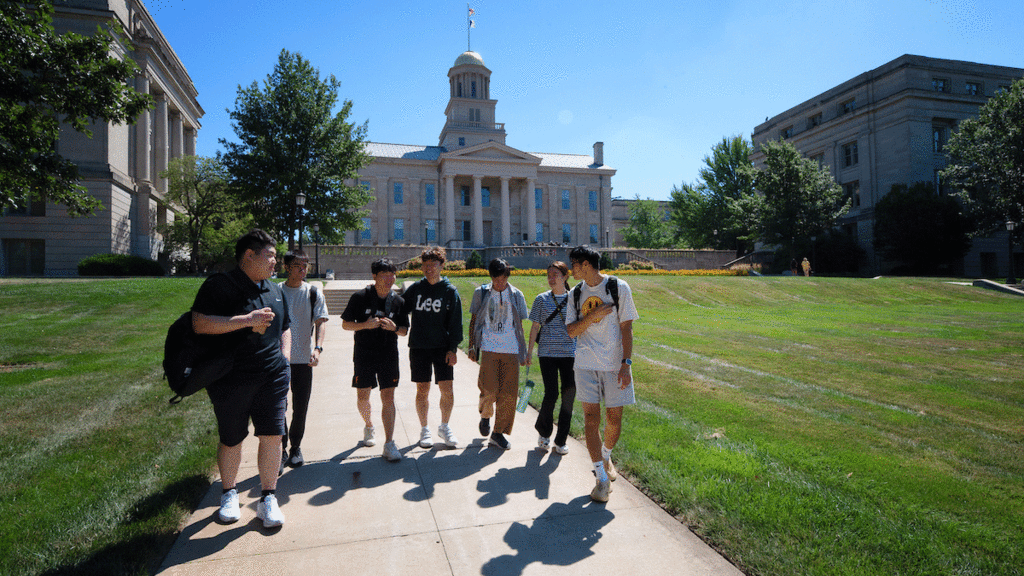 international students walking in front of Old Capitol