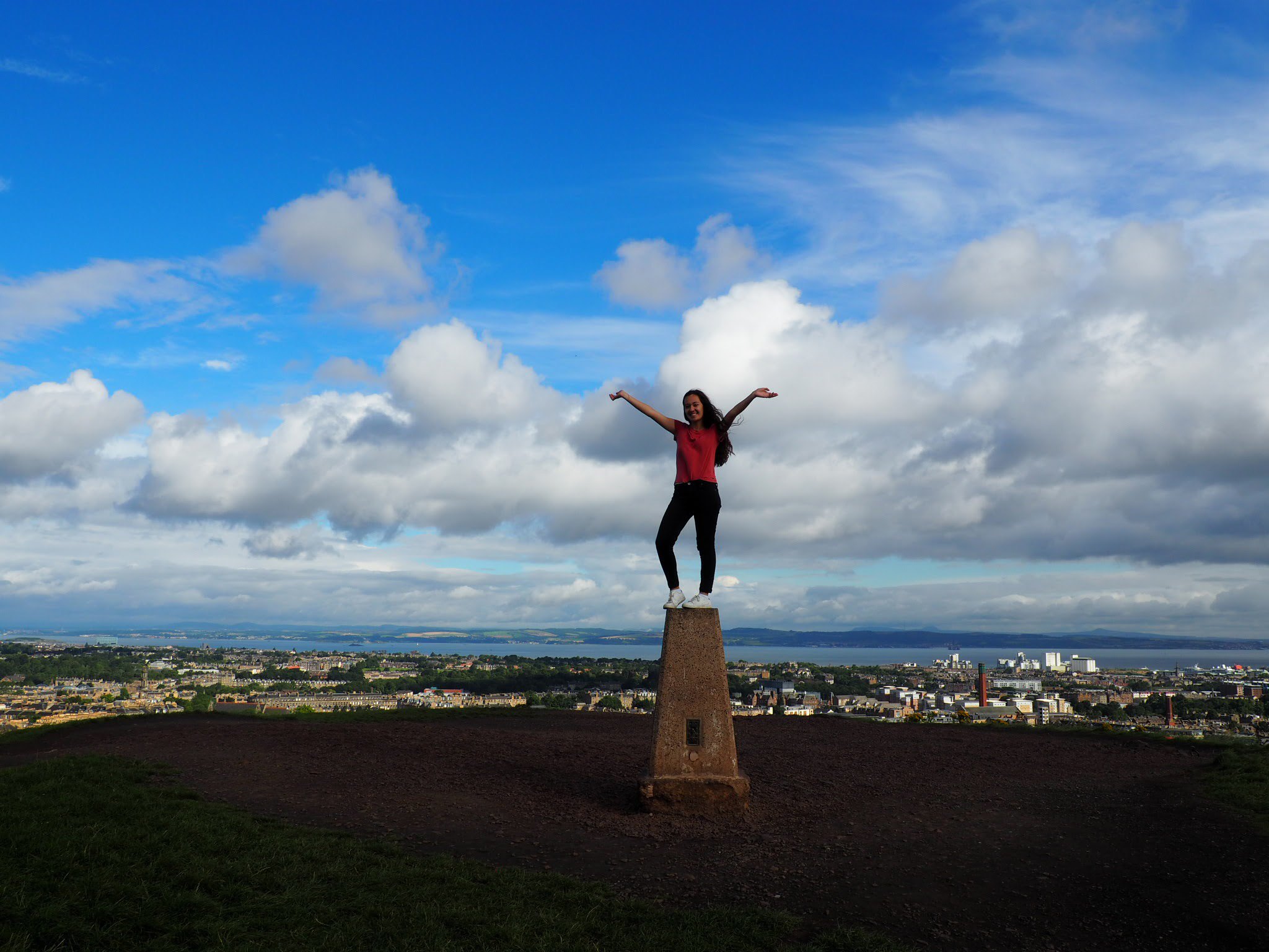 student on top of calton hill