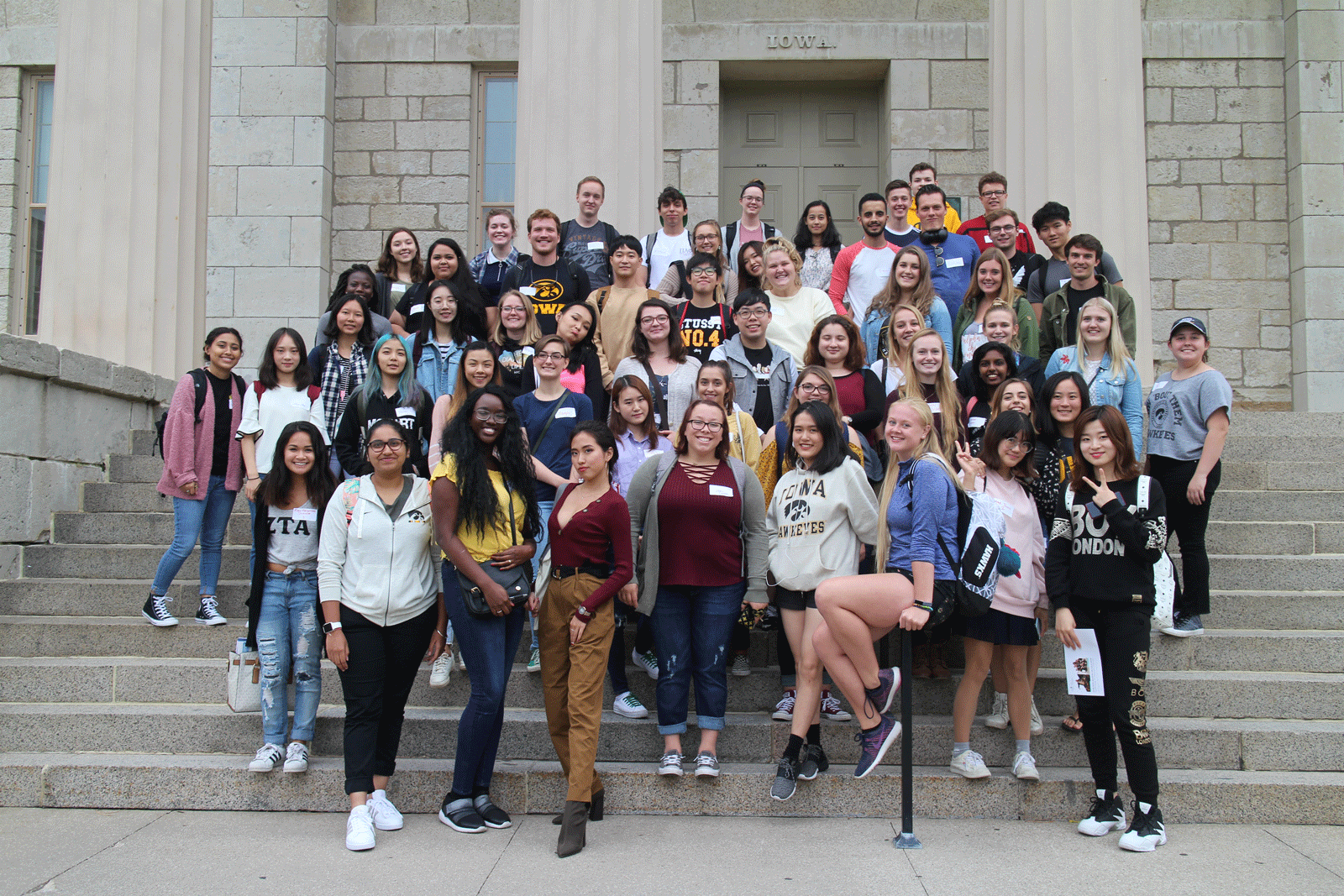 Global Buddies on stairs of Old Capitol