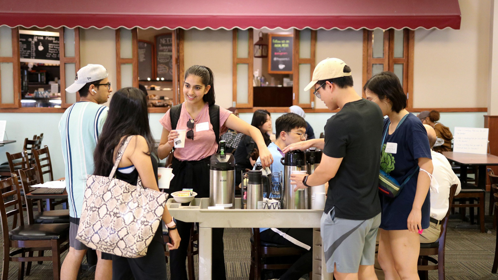 Students chatting over coffee