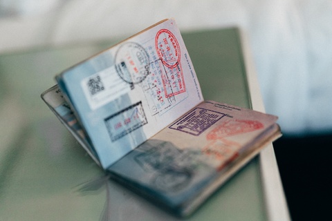 visa and entry stamps in passports