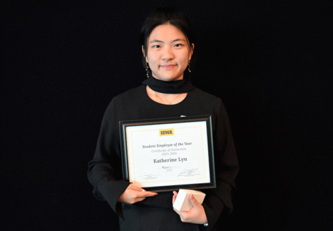 Katherine Lyu holding Student of the Year Award