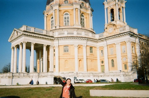 Sara Alvidrez standing in front of a building