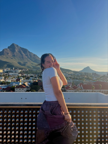 Veronica Ramirez posing in front of a mountain vista in South Africa