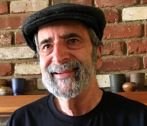 Lawrence Baron headshot with hat on