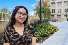 student posing for a photo and smiling