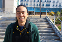 student posing for a photo and smiling