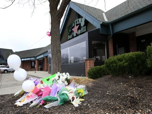 a small memorial for Srinivas Kuchibhotla is displayed outside Austins Bar and Grill in Olathe, Kan., Friday, Feb. 24, 2017. Kuchibhotla was shot and killed at the bar Wednesday, Feb. 22 ( Photo/Olin Wagner)