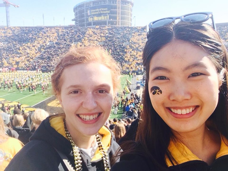 Friends Without Borders students attend a UI football game together.