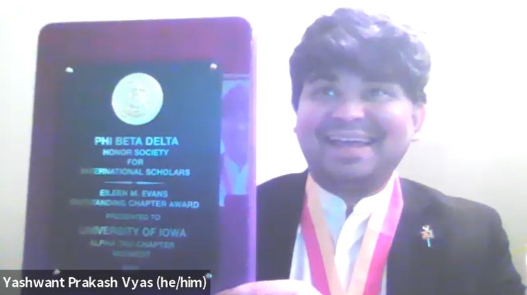 Image of Yashwant Prakash Vyas accepting the Phi Beta Delta Chapter Award