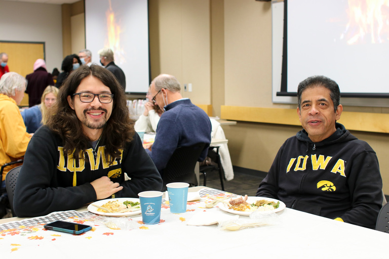 Guests enjoying a Thanksgiving meal on the University of Iowa campus