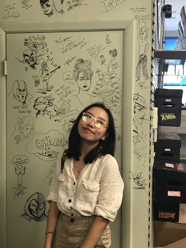 Sydney Nguyen in an Iowa City, Iowa, comic store