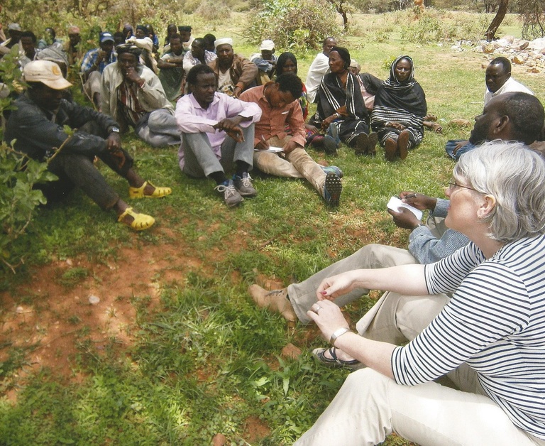 Karri Goeldner Byrne talking with elders at Haro Bake dam, Ethiopia, in 2012
