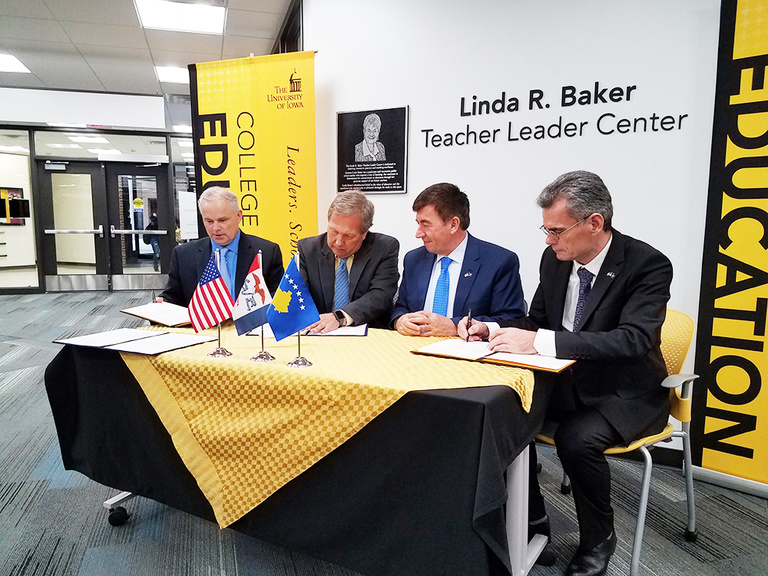 Photos by Andy Goodell  UI College of Education Dean Dan Clay, UI President Bruce Harreld, Kosovo Minister of Education Science and Technology Arsim Bajrami and University of Pristina President Marjan Dema sign a memorandum of understanding April 5, 2017.