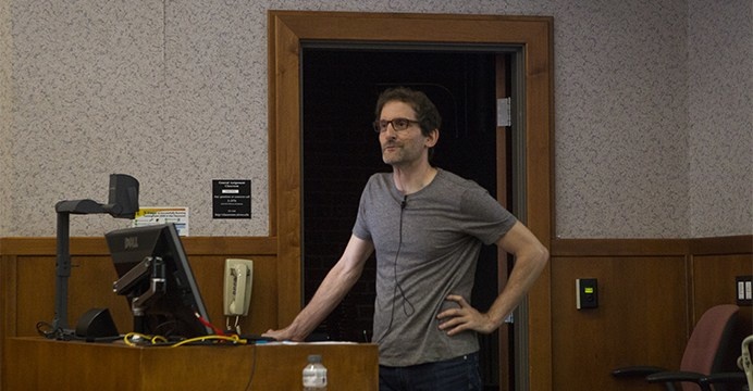 Poet Michael Morse looks at the audience of the Eleventh Hour in Phillips Hall on Wednesday, July 12 2017. Morse presented a workshop as part of the Iowa Summer Writing Festival called "Echo, Letter, Tweet: Writing as Correspondence." He taught at the Uni