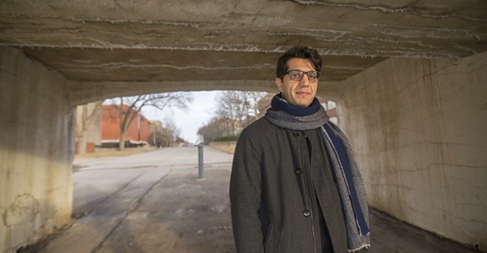 UI student Farzad Salamifar stands under a bridge near the University Library parking lot on Friday, Feb. 10, 2017. Salamifar came to Iowa City from Iran to obtain his doctorate in French. (The Daily Iowan/Margaret Kispert)