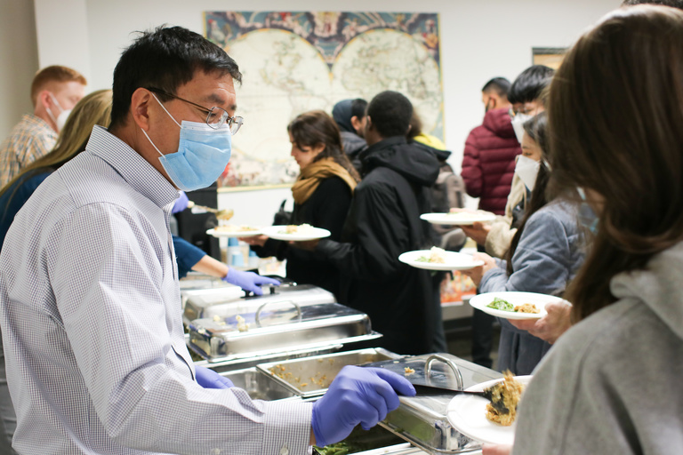Guests being served a Thanksgiving meal on the University of Iowa campus