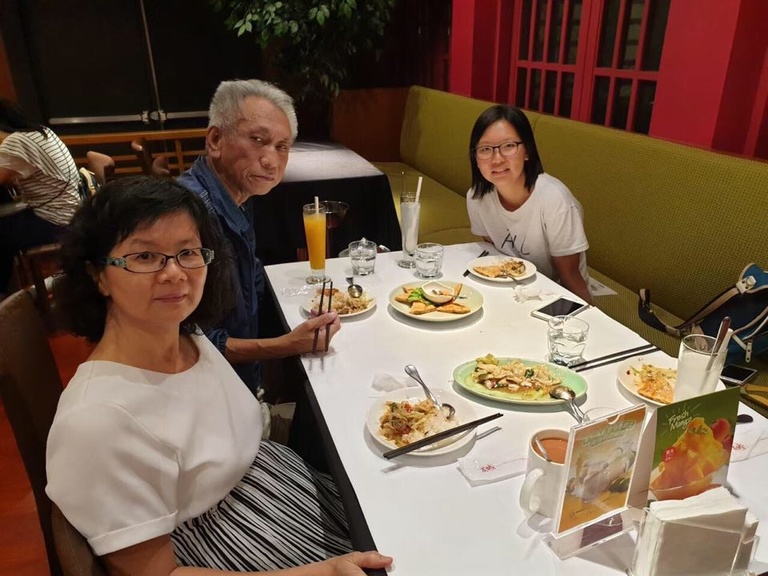 Siau-Tong Ding with her parents in Taiwan