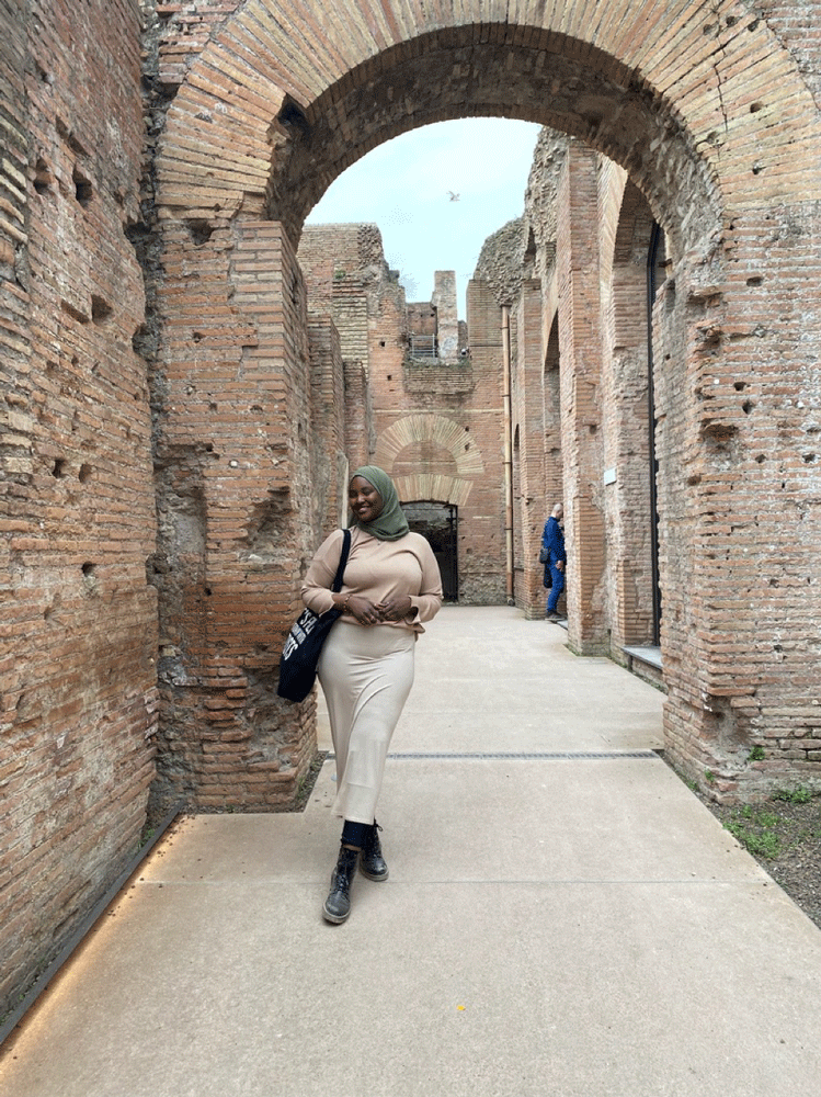 Sauda Abdullahi walking through the Roman Forum