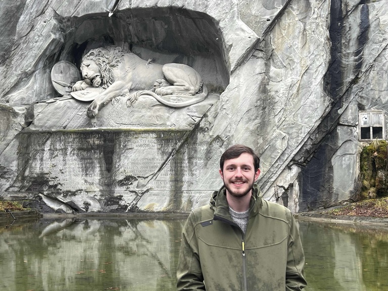 William Jones in front of the lion sculpture in Lucerne, Switzerland