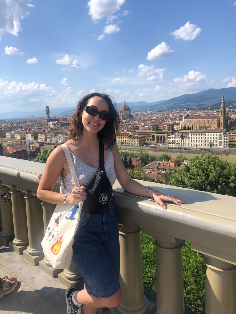 Sophia in Florence at Piazzale Michelangelo where you can see Florence's Cathedral Duomo from afar