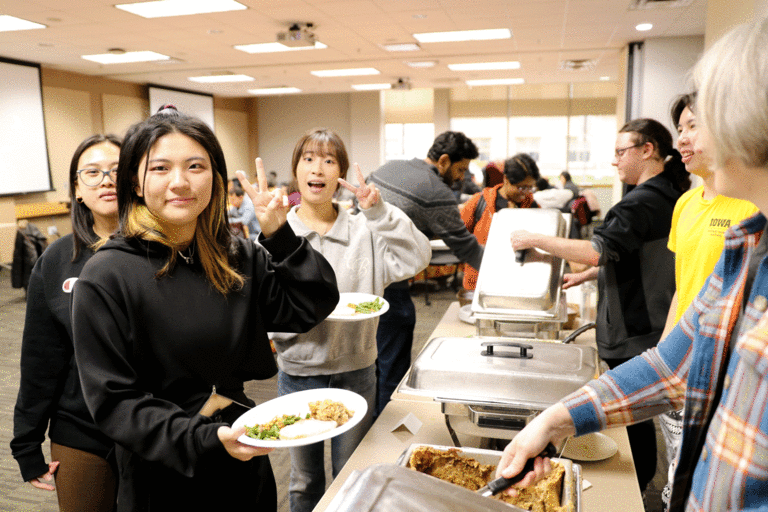 students in line getting food