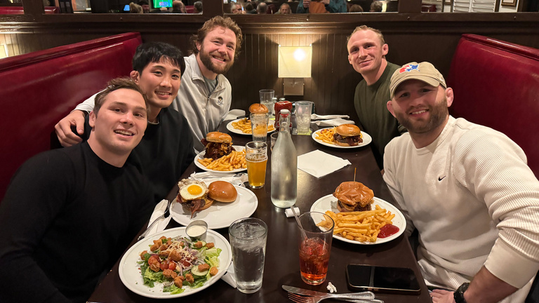 Keisuke Otoguro with Iowa wrestling teammates.