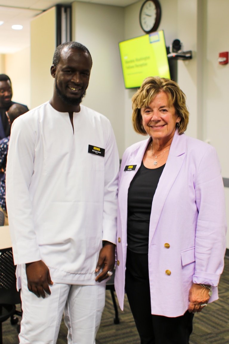President Barbara Wilson poses in photo with a Mandela Washington Fellows.