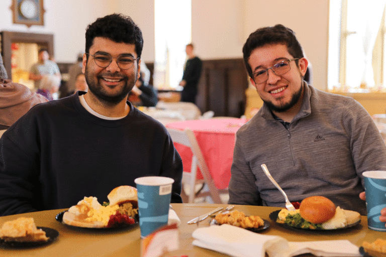 two students smiling