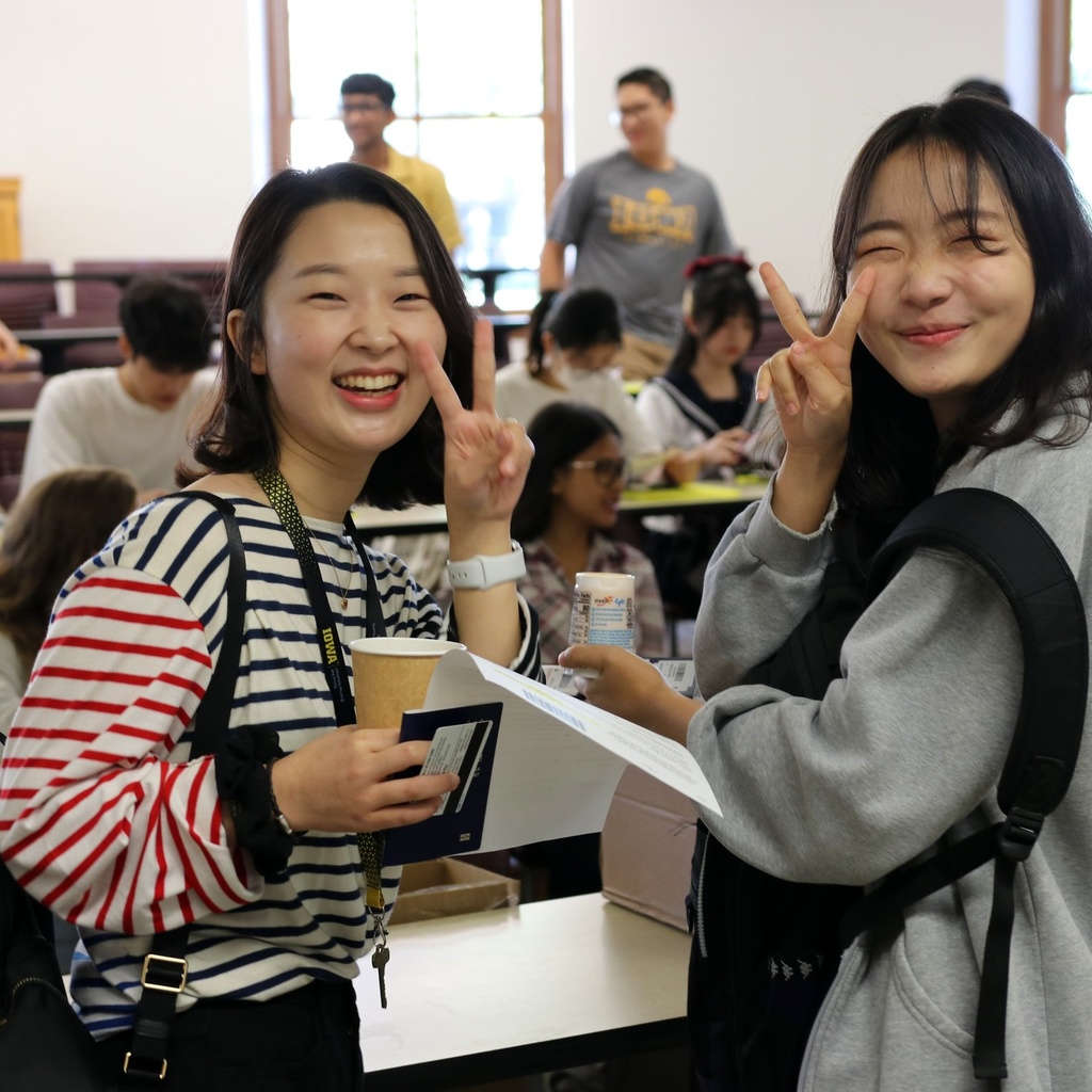 international students smiling in classroom