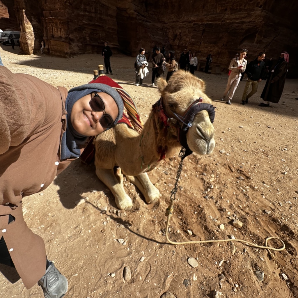 Maryam Mohammed selfie in front of a camel