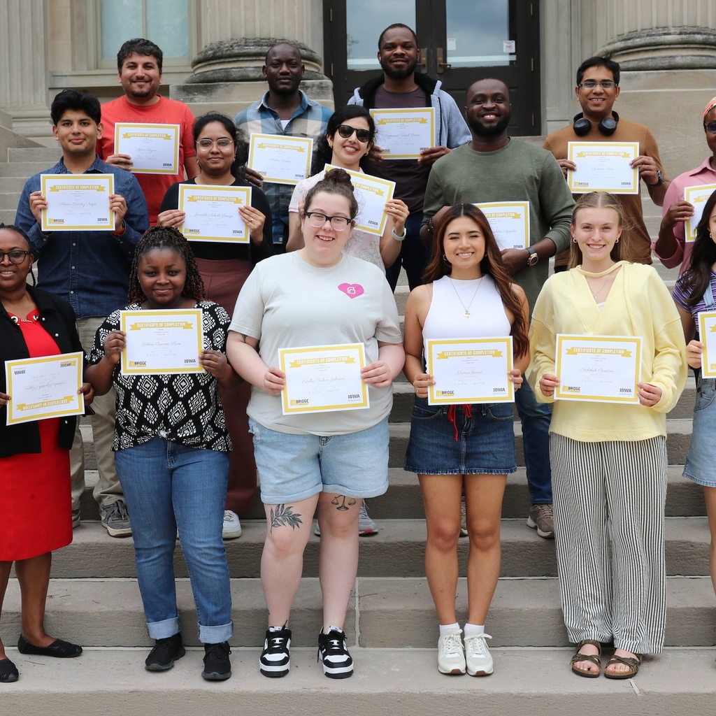 Students holding their Bridge certificates