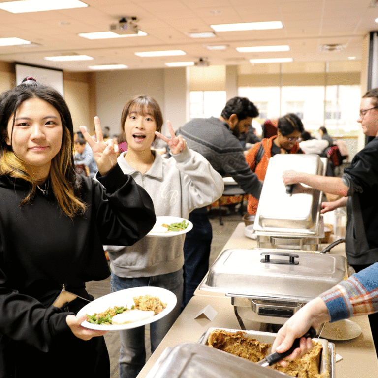 students in line getting food