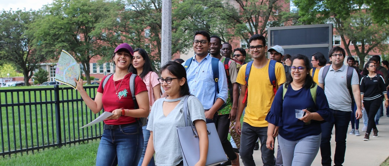 international students walking on campus during orientation