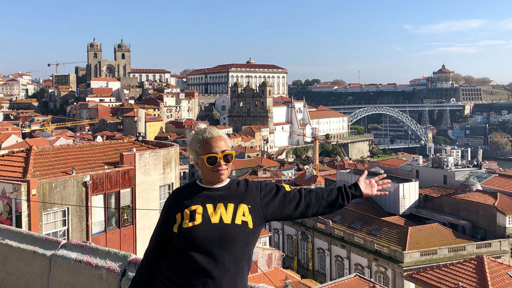 Rita Guzman wearing Iowa shirt in Portugal
