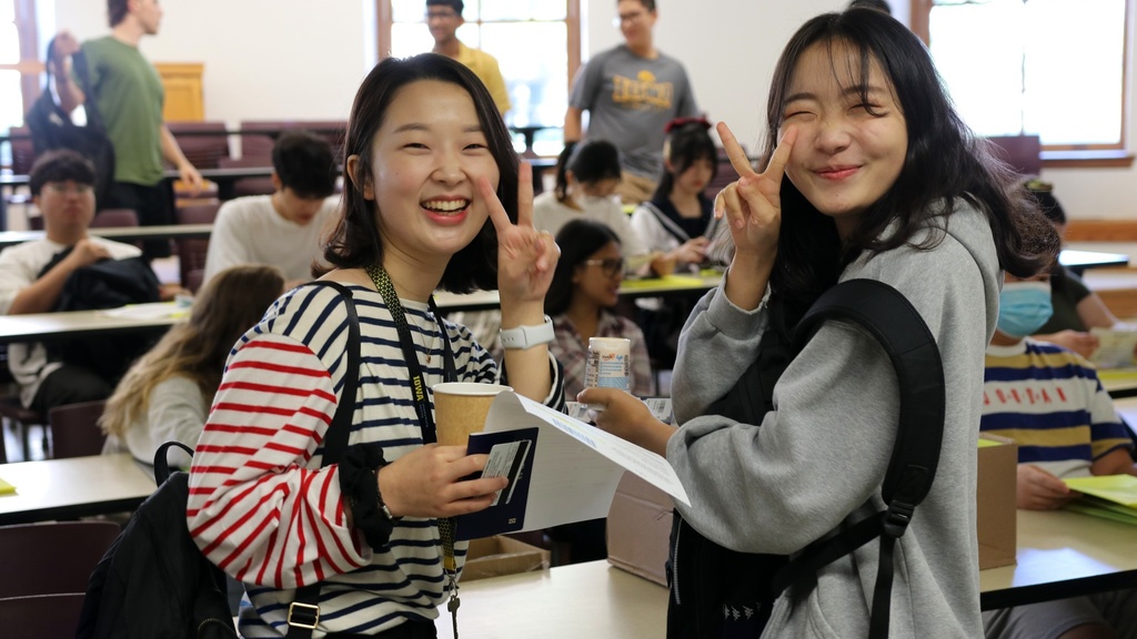 international students smiling in classroom