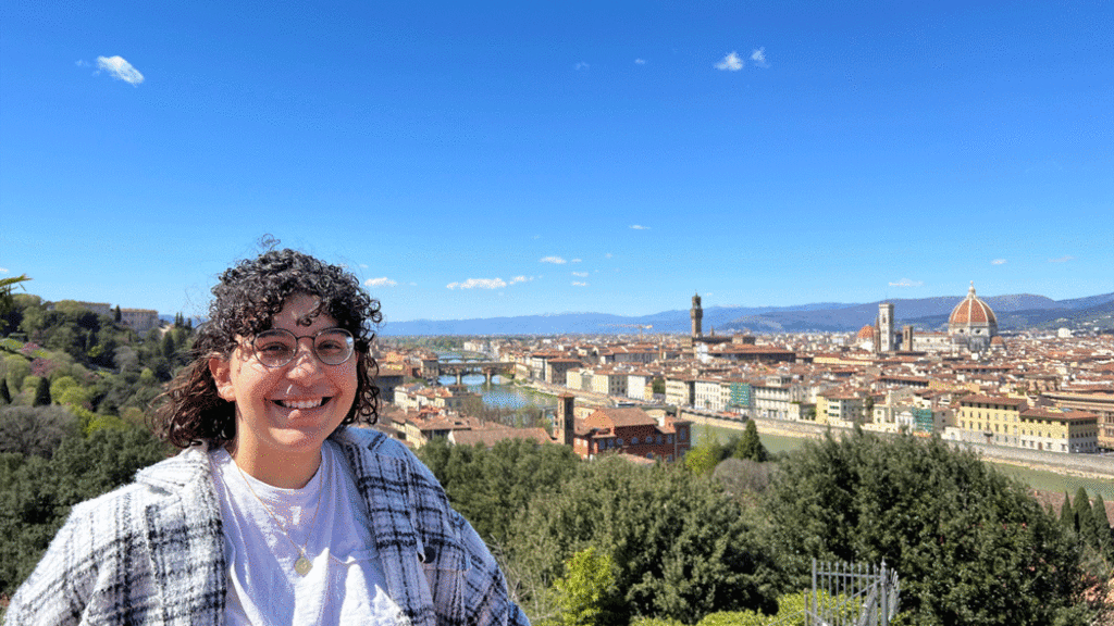Leah Cooke with Italian landscape background