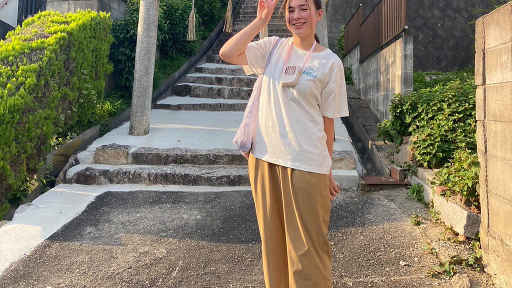 Abby Fowler standing in front of Japanese arch in Japan