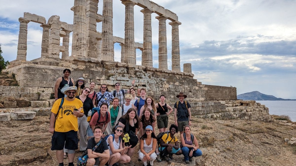 Deb Trusty and students in front of Temple of Poseidon in Sounion, Greece