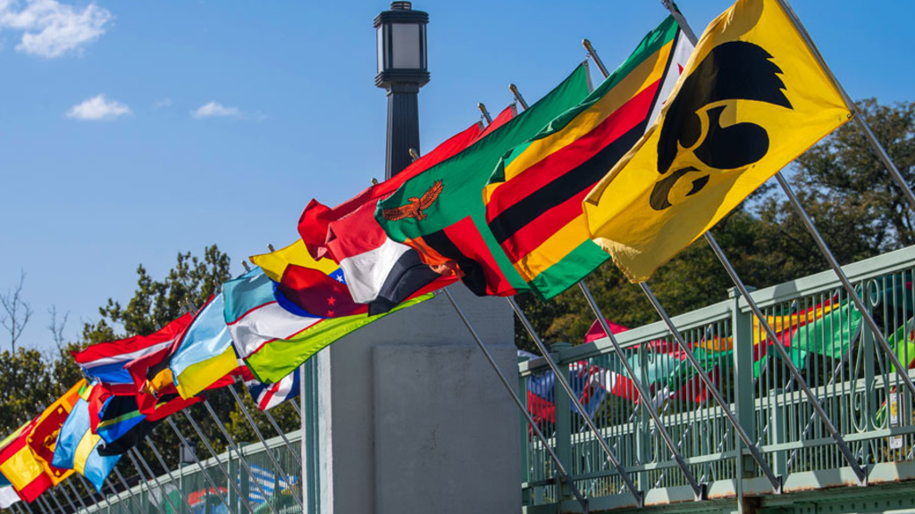 Bridge of flags with Hawkeye flag and world flags