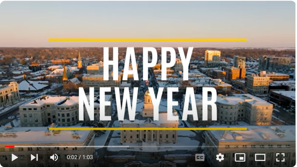 Happy New Year with aerial shot of Iowa City