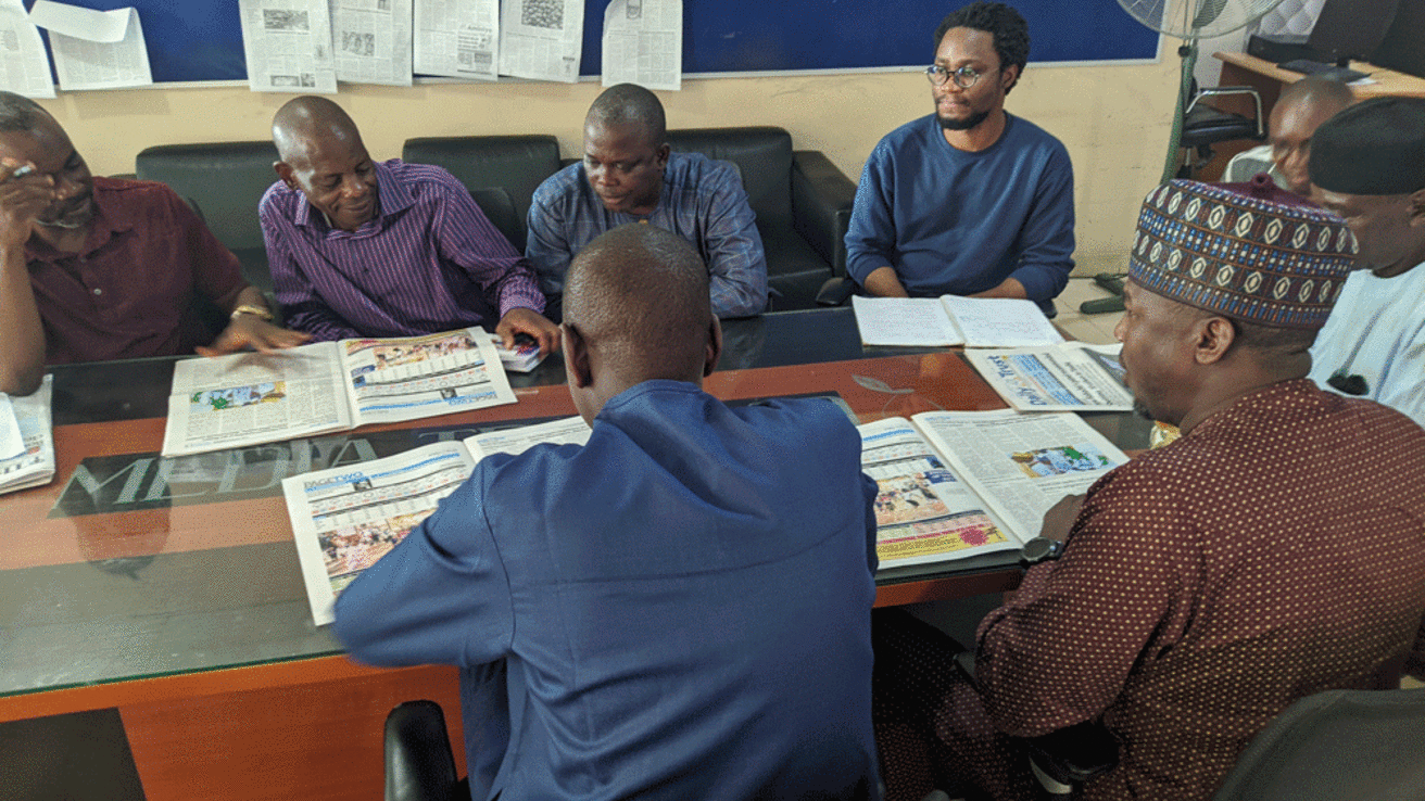 Munachim Amah with editorial team in Nigeria